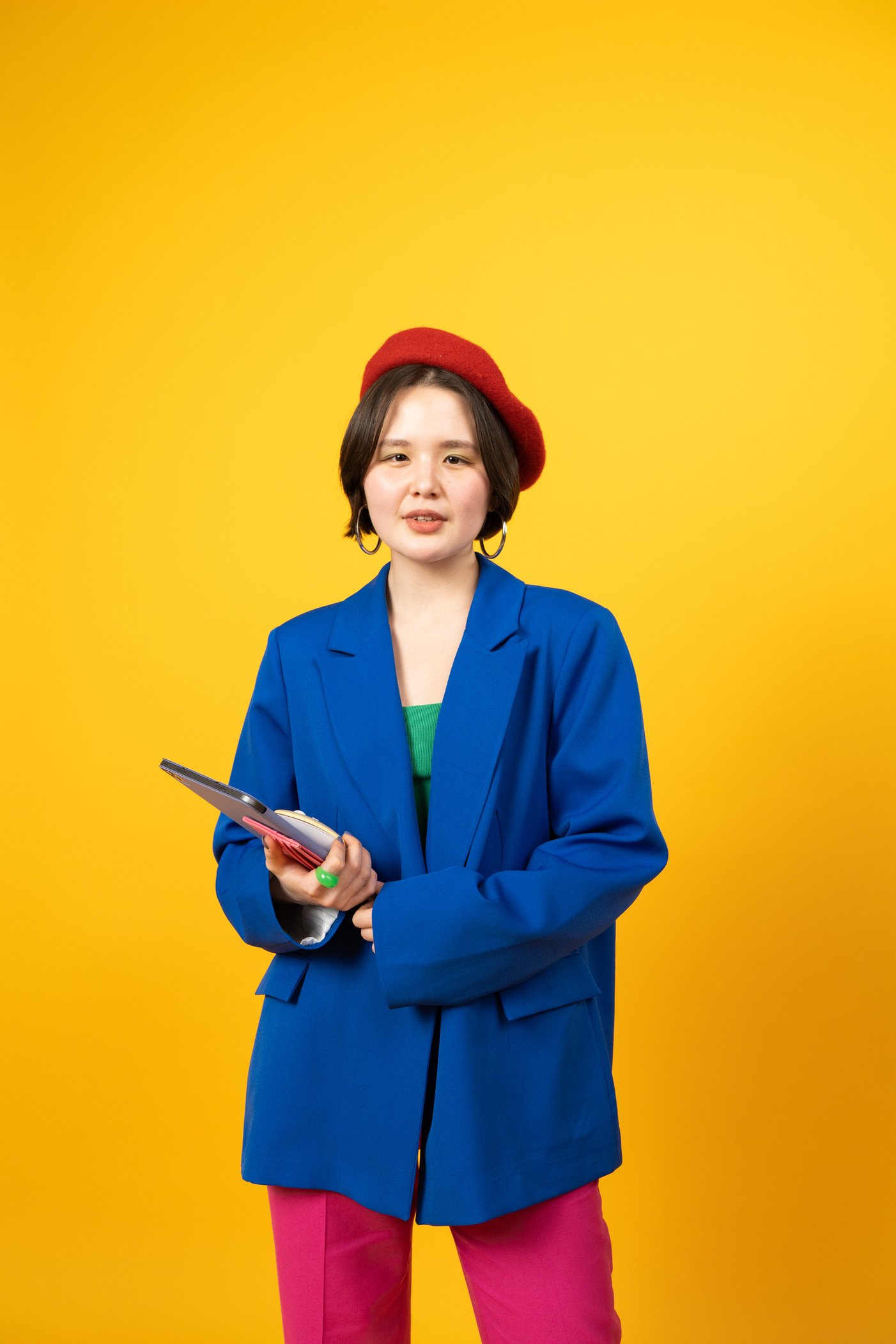 Tech Humans Portrait of Woman Holding Gadgets